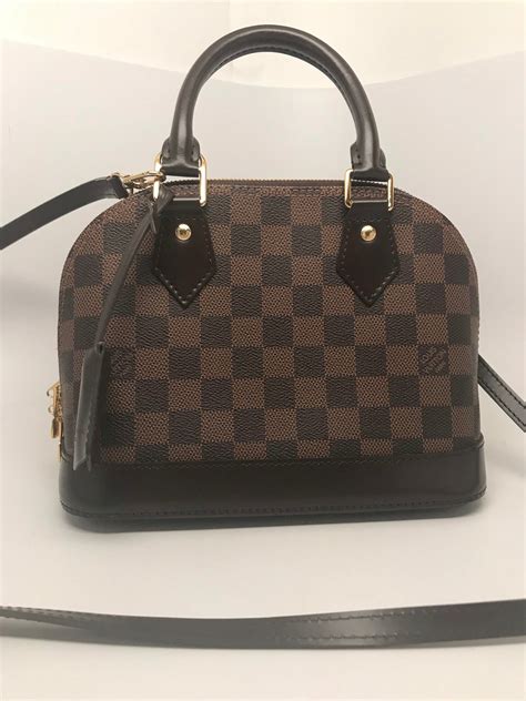 louis vuitton alma gm damier ebene|louis vuitton damier ebene clutch.